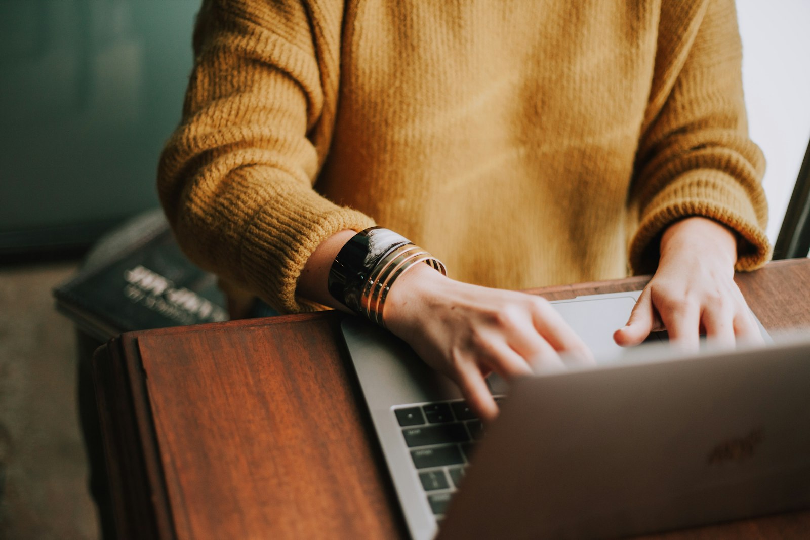 Person editing website copy on a laptop
